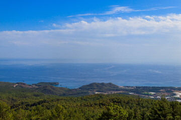 View of the Taurus mountains and the Mediterranean sea from a top of Tahtali mountain near Kemer, Antalya Province in Turkey