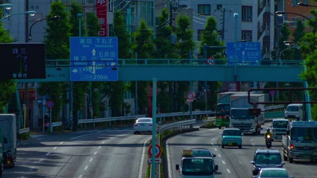 A timelapse of downtown street at Kanpachi avenue in Tokyo long shot panning