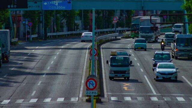 A timelapse of downtown street at Kanpachi avenue in Tokyo long shot panning