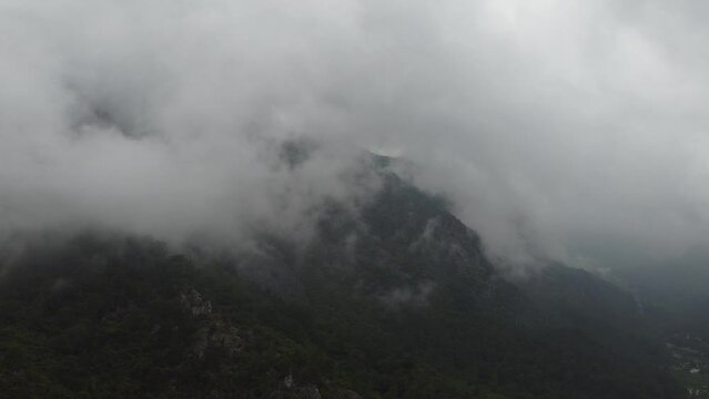 Mountain valley in rain clouds. High quality 4k footage