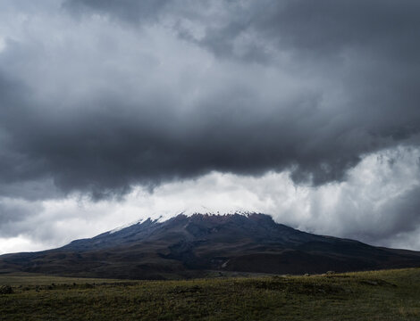 Cotopaxi volcano on a stormy day in Cotopaxi National Park, Parque Nacional Cotopaxi, Ecuador, South America
