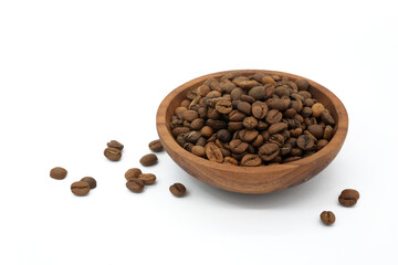 Coffee beans in wooden bowl isolated on white background