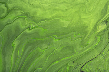 Abstract fluid art background dark green colors. Liquid marble. Acrylic painting with olive gradient and splash.