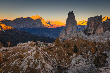 Obraz premium Autumn in the Italian Dolomites. The most beautiful time of the year to visit this place. Beautiful colors and breathtaking views. Mountain peaks above the valleys.
