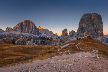 Autumn in the Italian Dolomites. The most beautiful time of the year to visit this place. Beautiful colors and breathtaking views. Mountain peaks above the valleys.