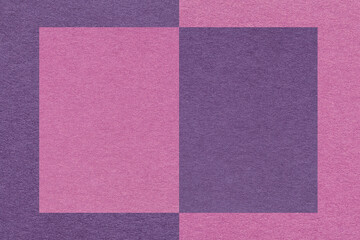 Fototapeta premium Texture of craft dark purple and lilac paper background, half two colors, macro. Structure of violet craft cardboard.