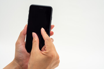 スマートフォンを操作する女性の手４