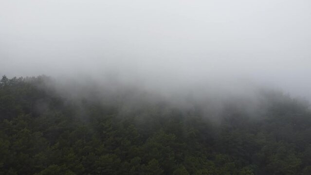 Mountain valley in rain clouds. High quality 4k footage