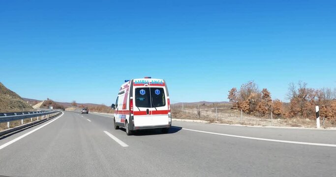 Ambulance van drive fast on on highway road