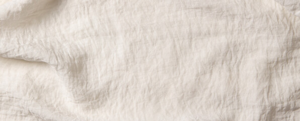 White crumpled fabric texture background. Natural organic eco textiles canvas banner background. Top view