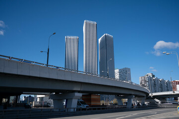 Fototapeta na wymiar high-rise buildings in Moscow against the blue sky. Urban spring landscape