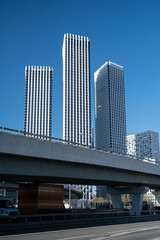 Fototapeta na wymiar high-rise buildings in Moscow against the blue sky. Urban spring landscape