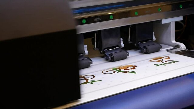 The print plotter prints the spectrum of colors on a large area.