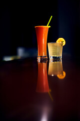 freshly squeezed juice and an invigorating cocktail in the gym. selective focus, low depth of focus. a small grain for artistic effect