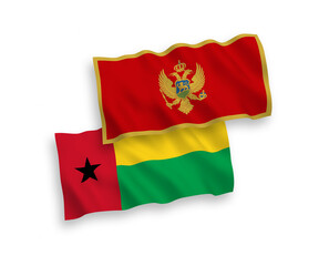 Flags of Montenegro and Republic of Guinea Bissau on a white background