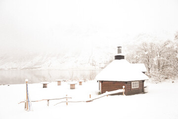 Lakes Side Fire Hut in the Snow in Lofoten norway
