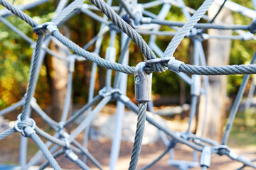 close-up photo of rope climbing net on playground