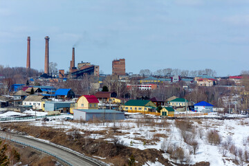 View of the village of Yashkina and the buildings of the stopped oldest cement plant