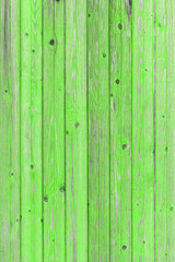 Fototapeta premium Vintage fence of old wooden boards. Texture of an aging wooden surface. Beautiful wooden background.