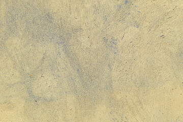 The texture of the old cracked blue plaster. Construction vintage background.