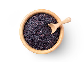 Pile of black rice in wooden bowl isolated on white