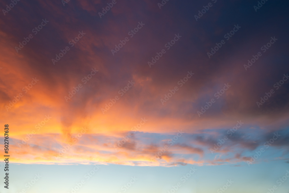 Wall mural dramatic sky with clouds at sunset, nature background