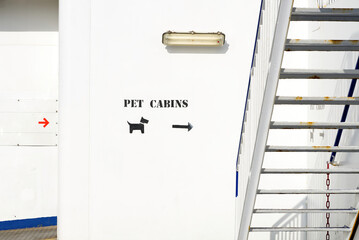 houses for pets sign on the ship. Pet Cabins on the Ferry