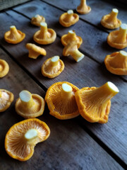 chanterelle mushrooms on a wooden board