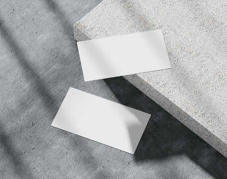 Blank white business card on the concrete, branding paper, 3d rendering, 3d illustration 