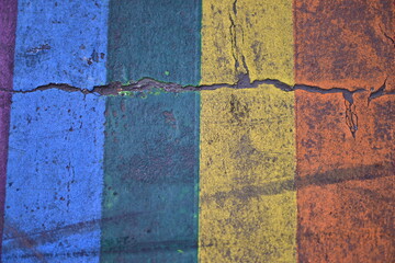 A colorful, zebra crossing with ruptures in Paris in the LGBTQ-district.