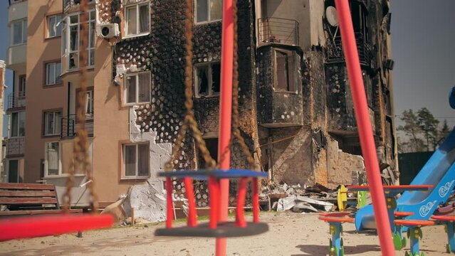 War damage house building cars people city civil rocket bomb Ukraine