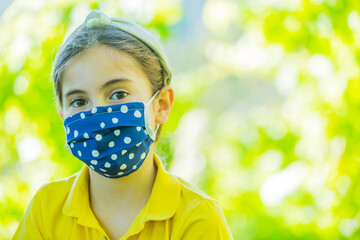 Little girl with mask
