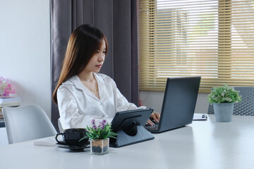 Woman is using a computer laptop. Online live chat chatting on an application communication website...