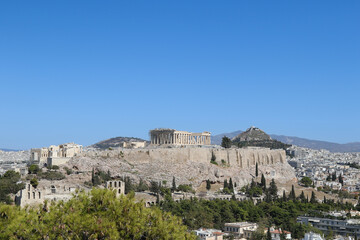 Fototapeta na wymiar Expansive view of the Acropolis with Mount Lycabettus in the background, Athens, Greece