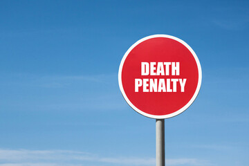 'Death penalty' sign in round red frame. Clear blue sky is on background