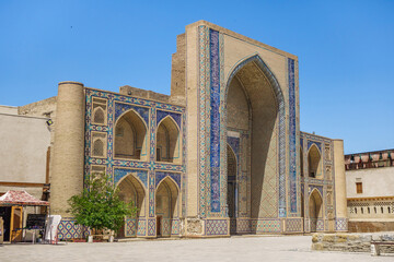 Fototapeta na wymiar Panorama of building of Ulugh Beg Madrasah in Bukhara, Uzbekistan. Built in 14th century. This is UNESCO object