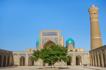 Panorama of the Kalyan mosque and its famous minaret of the same name, Bukhara, Uzbekistan. Old tower is a symbol of the ancient city