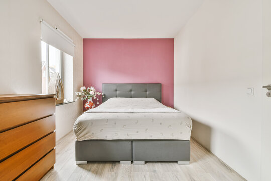 Bedroom interior with wooden commode