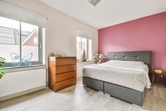 Bedroom interior with wooden commode