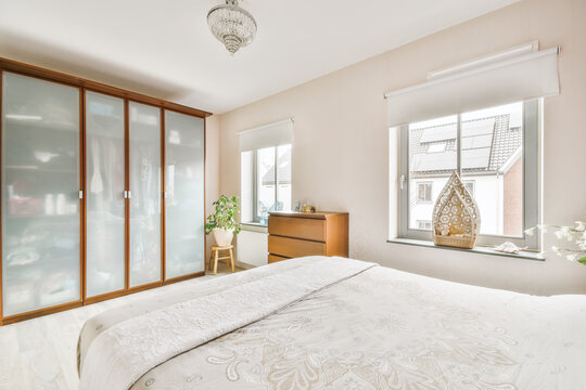 Modern bedroom interior with closet