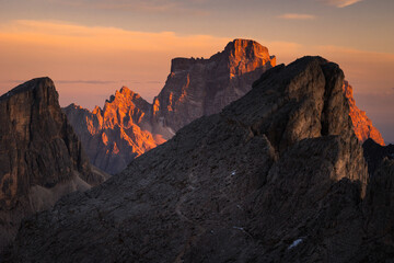 Autumn in the Italian Dolomites. The most beautiful time of the year to visit this place. Beautiful colors and breathtaking views. Mountain peaks above the valleys.