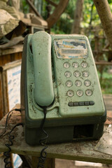 A broken home telephone in old vintage style from random abandoned place