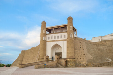Panorama of the central entrance to the ancient citadel Ark in Bukhara, Uzbekistan. Walls of the...