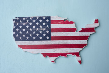 American flag in the form of a USA map on a light background.