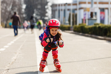 Young happy skater trying exciting outdoor activity.