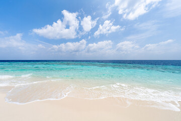 Fototapeta na wymiar Beautiful beach with white sand and turquoise water