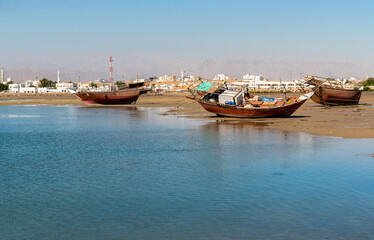 Fototapeta premium Old abandoned fishing boats in the bay of Sur, Sultanate of Oman in the Middle East.