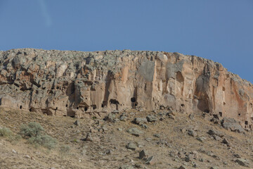 Fototapeta na wymiar Ancient dwellings in caves in the rocks on Kayseri province, Turkey, Asia