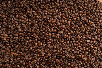 Roasted coffee beans close up view