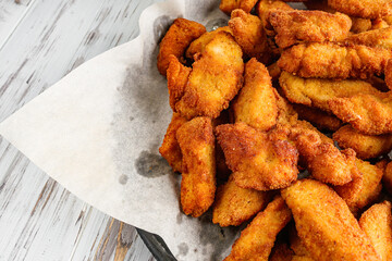 chicken nuggets on a white wooden rustic background